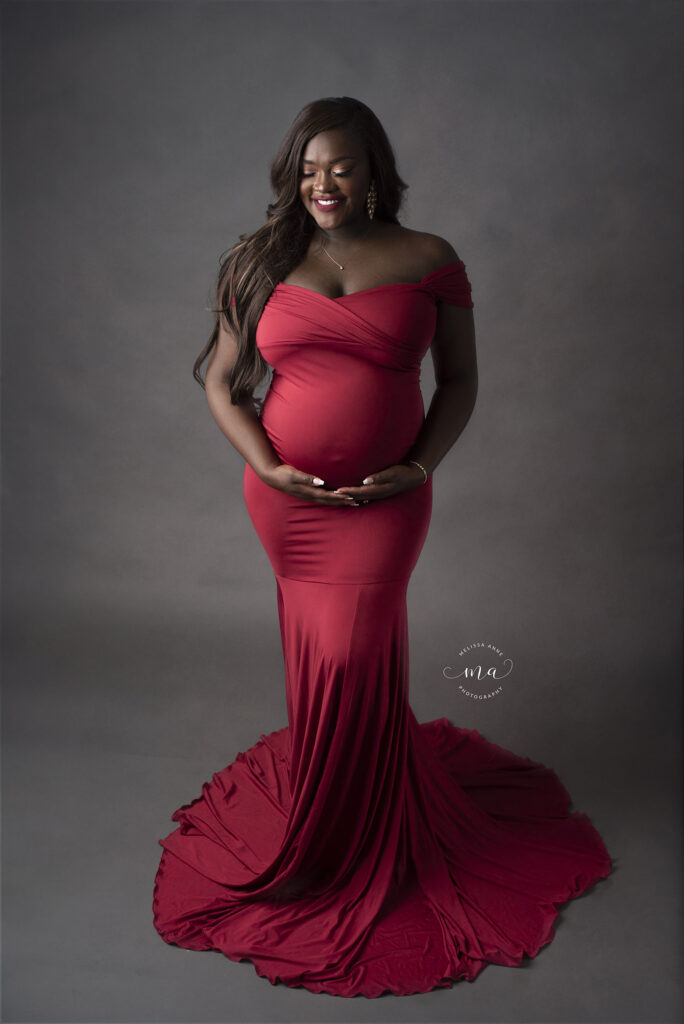 troy michigan maternity newborn photographer melissa anne photography pregnancy photo session red fitted gown