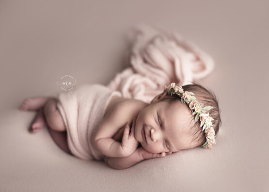 troy michigan newborn photographer melissa anne photography smiling baby girl with floral crown