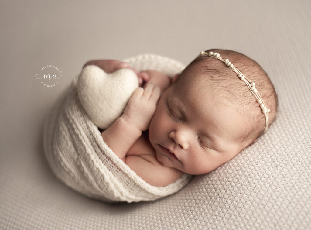 michigan newborn photographer melissa anne photography wrapped baby girl with felt heart