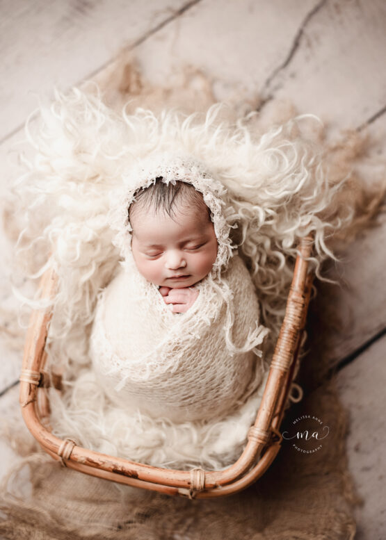 Michigan newborn photographer Melissa Anne Photography wrapped neutral baby girl with bonnet