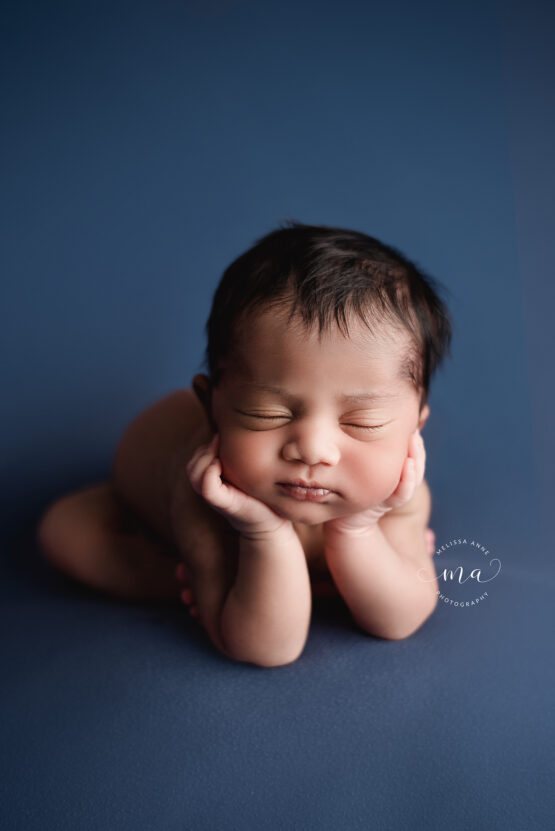 Michigan newborn photographer Melissa Anne Photography froggy pose baby boy dark blue