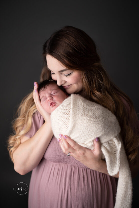 Michigan newborn photographer Melissa Anne Photography mother and newborn baby girl snuggling