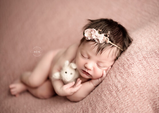 Michigan newborn photographer Melissa Anne Photography sidelay pose with bunny stuffie