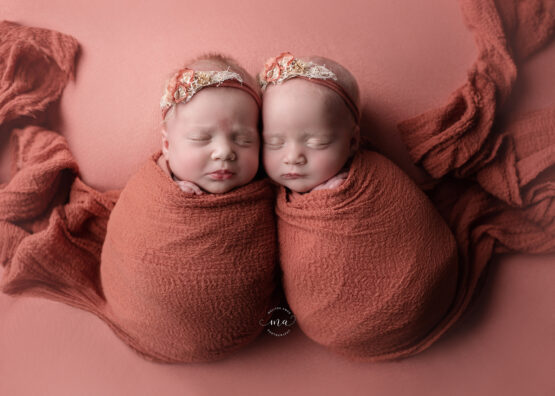 Michigan newborn photographer Melissa Anne Photography twin girls wrapped potato sack pose with headbands