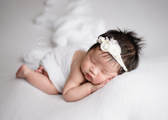 Michigan newborn photographer Melissa Anne Photography bum up pose white