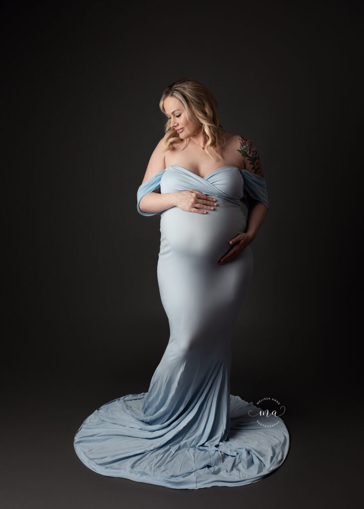 Michigan maternity photographer Melissa Anne Photography baby blue gown in studio maternity photo shoot