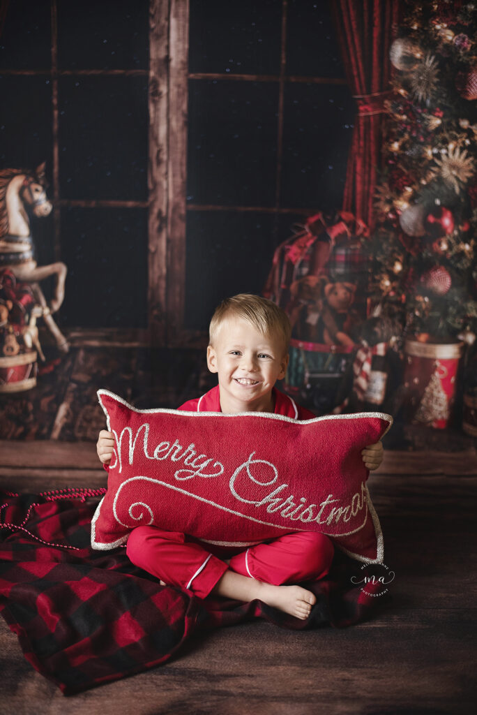 Troy Michigan photographer Melissa Anne Photography Christmas photo session little boy wearing pajamas