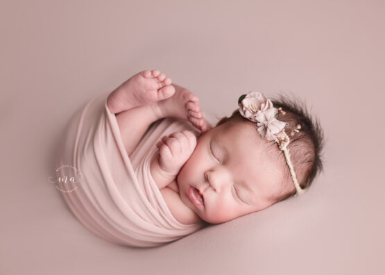 Troy Michigan newborn photographer Melissa Anne Photography baby girl with pink egg wrap
