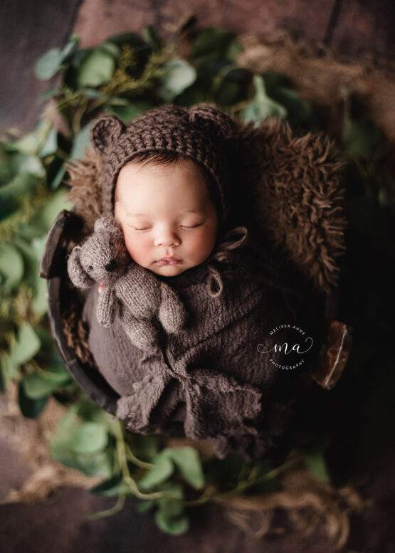 Michigan newborn photographer Melissa Anne Photography baby boy in wooden bucket with teddy bear