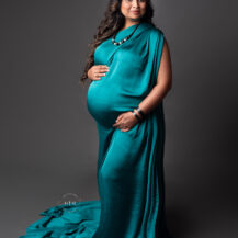 Metro Detroit maternity photographer Melissa Anne Photography pregnant mother to be in emerald gown with long dark hair