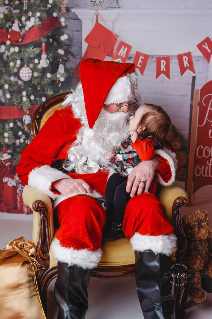 Christmas mini sessions Troy Michigan Melissa Anne Photography Santa visiting with little girl