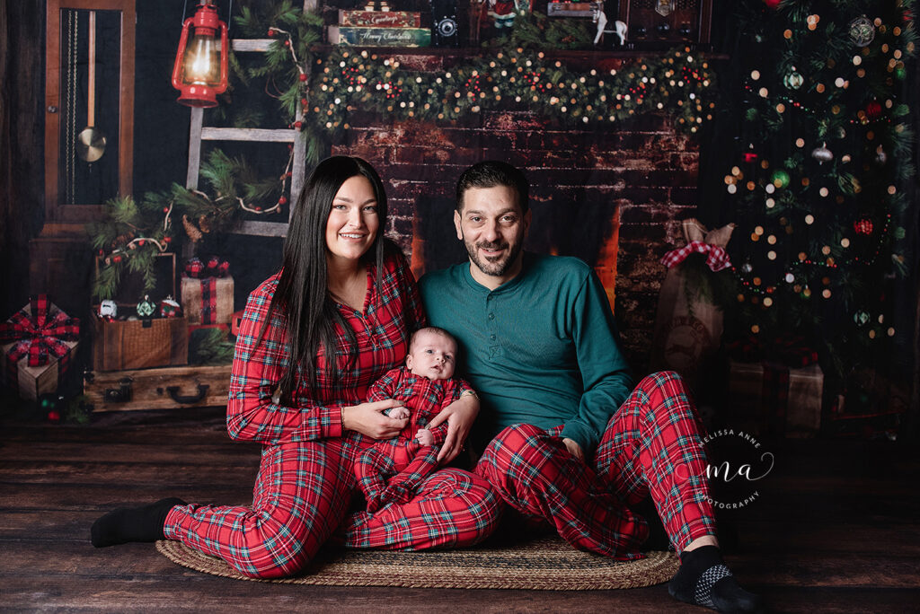 Michigan photographer Melissa Anne Photography Christmas mini session with family with newborn in pajamas