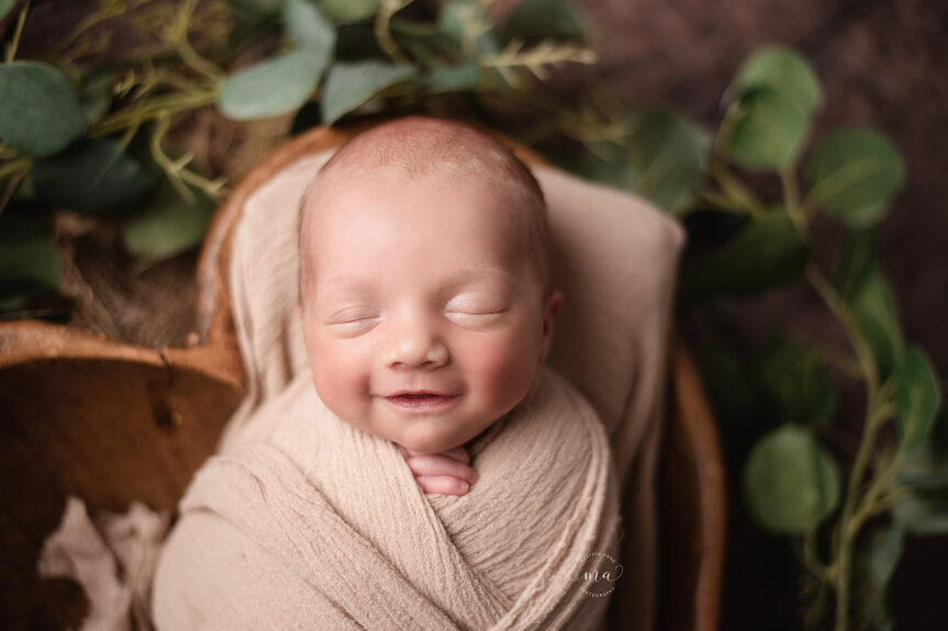 Troy Michigan newborn photographer Melissa Anne Photography baby boy smiling