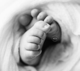 Troy Michigan newborn photographer Melissa Anne Photography macro detail of baby feet black and white photo
