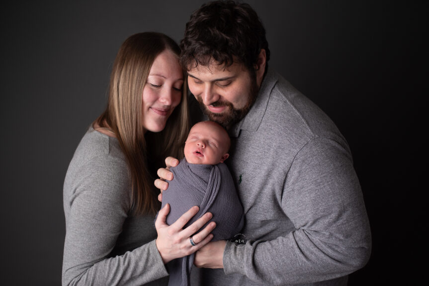 Troy Michigan newborn photographer Melissa Anne Photography parents with newborn baby boy
