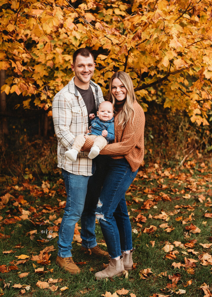 Utica Michigan family photographer Melissa Anne Photography colorful fall family photos in park baby with parents