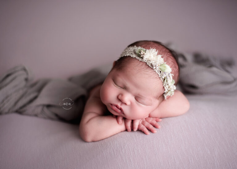 6 Simple Steps to Prepare for Your Newborn Troy MI newborn photographer Melissa Anne Photography baby girl with purple flowy wrap and headband