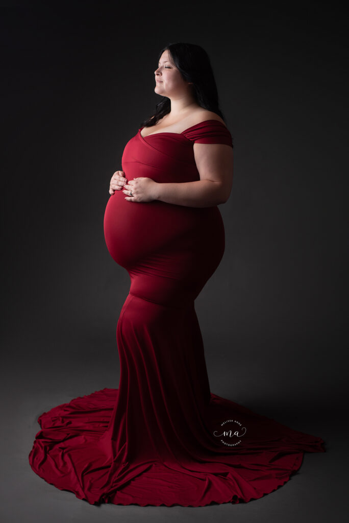 Birmingham Michigan maternity photographer Melissa Anne Photography studio maternity session red mermaid dress