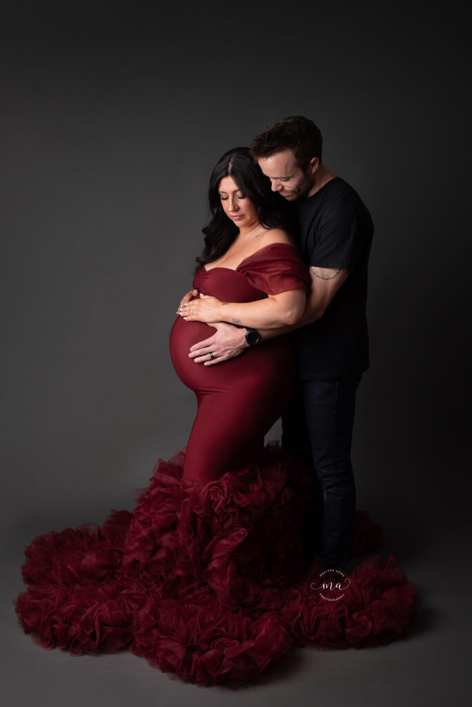 Clarkston Michigan maternity photographer Melissa Anne Photography studio maternity photo session with red couture gown