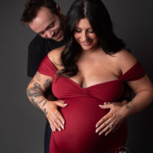 Troy Michigan maternity newborn photographer Melissa Anne Photography maternity session in studio with couture gown