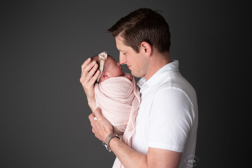 Troy Michigan newborn photographer Melissa Anne Photography dad with newborn baby girl