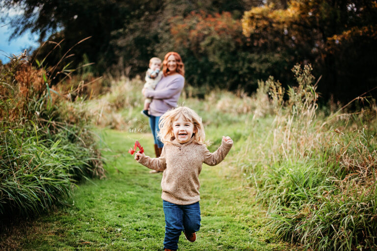 Metro Detroit Michigan photographer Melissa Anne Photography boy running in park