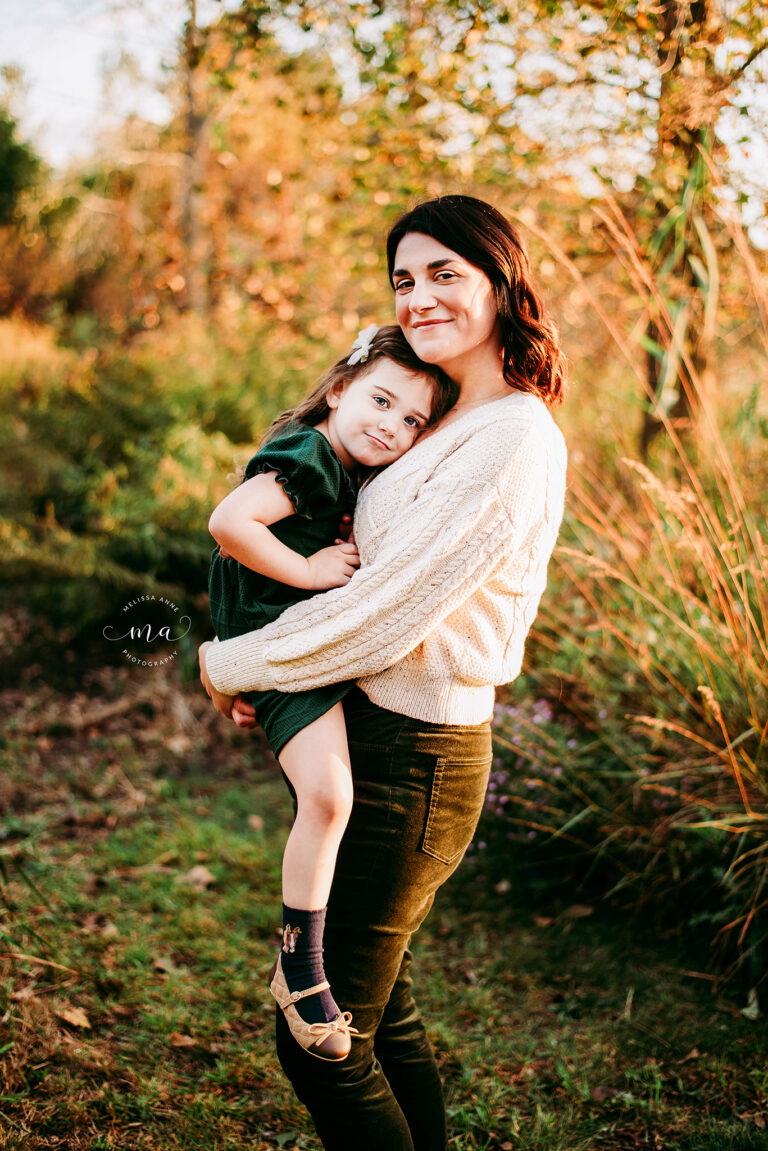 Troy Michigan family photographer Melissa Anne Photography mom holding daughter in fall outdoor photo session