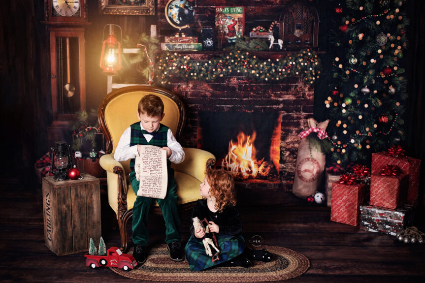 Troy Michigan Christmas mini sessions Melissa Anne Photography brother and sister in front of fireplace in vintage family room