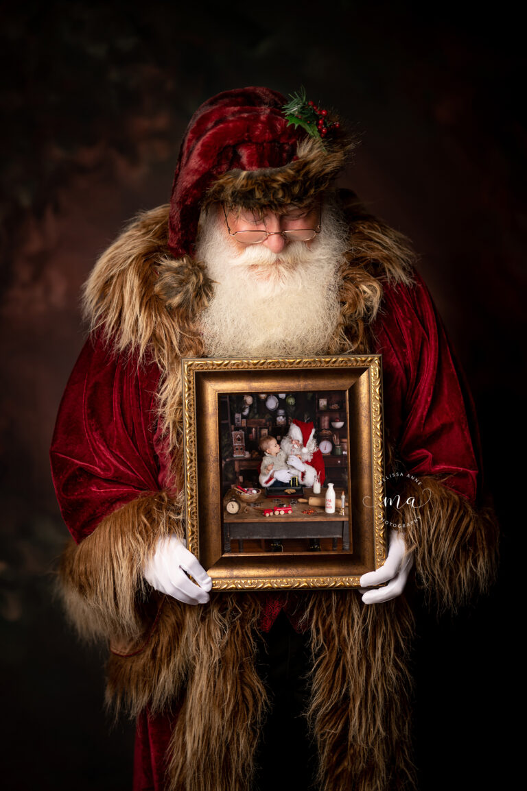 Melissa Anne Photography Santa holding framed photo Christmas